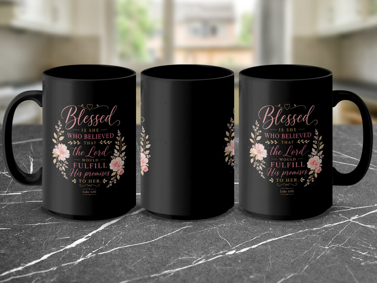 Three black mugs with floral wreath design and text "Blessed is she who believed that the Lord would fulfill His promises to her. Luke 1:45".