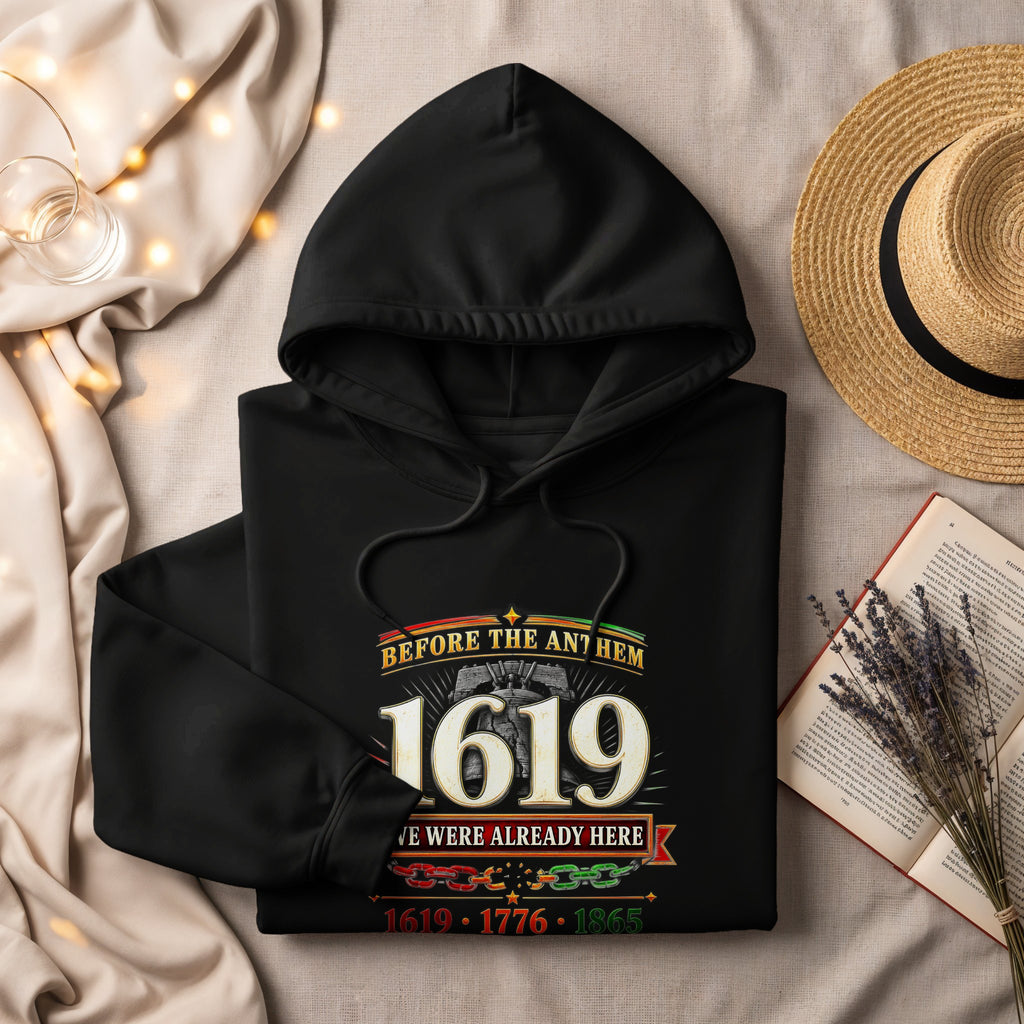Black hoodie with "Before the Anthem 1619 We Were Already Here" graphic.
