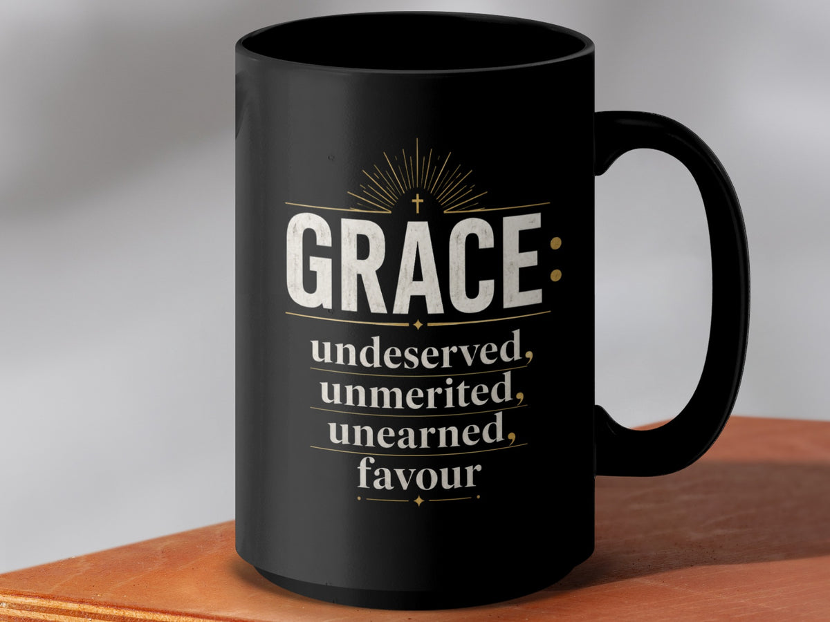 Black mug with "GRACE: undeserved, unmerited, unearned, favour" text and a cross.