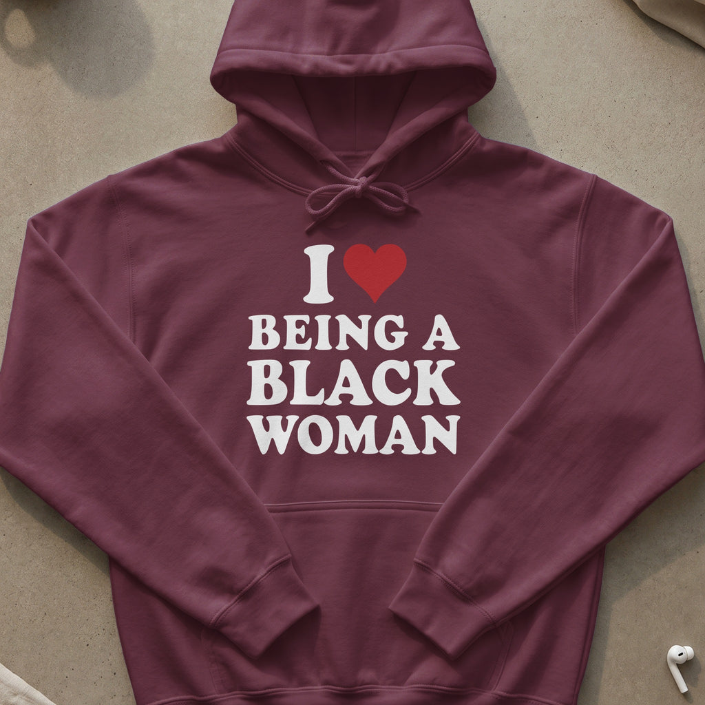 Maroon hoodie with white text and a red heart: "I Love Being A Black Woman"