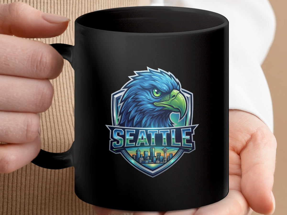 Black mug with a blue eagle emblem and "Seattle" text over a city skyline.