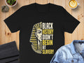 Black History Didn't Begin at Slavery text on a black t-shirt with a pharaoh's portrait.
