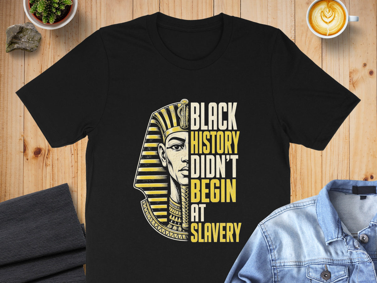 Black History Didn't Begin at Slavery text on a black t-shirt with a pharaoh's portrait.