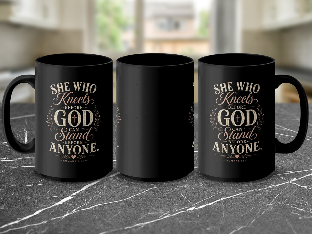 Black mug with text "She who kneels before God can stand before anyone."