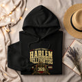 Black hoodie with Harlem Hellfighters 369 WWII graphic, featuring a snake and rifles.