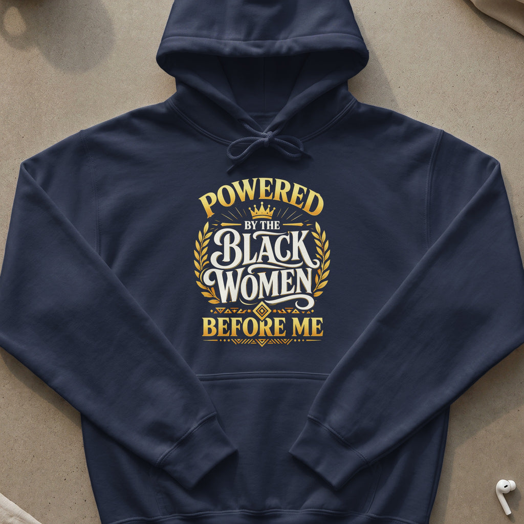 Navy blue hoodie with gold text that reads "Powered by the Black Women Before Me".
