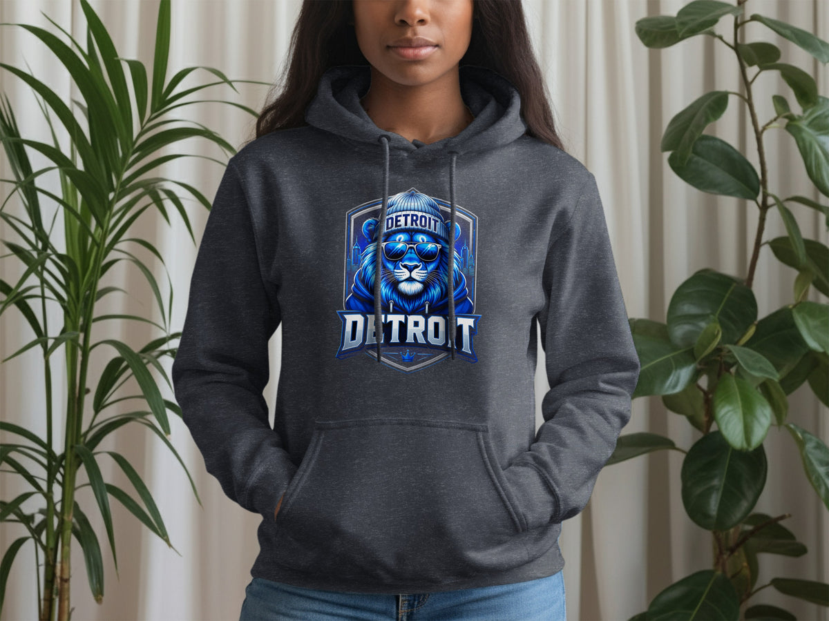 Dark grey hoodie with a blue lion graphic wearing a beanie and sunglasses, text "DETROIT".