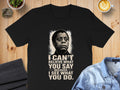 Black t-shirt featuring James Baldwin quote: "I can't believe what you say because I see what you do."