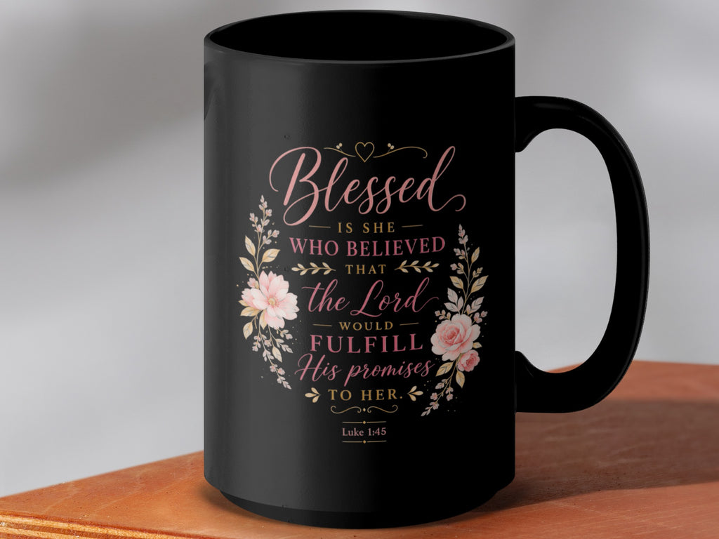 Black mug with floral design and quote: "Blessed is she who believed that the Lord would fulfill his promises to her. Luke 1:45"