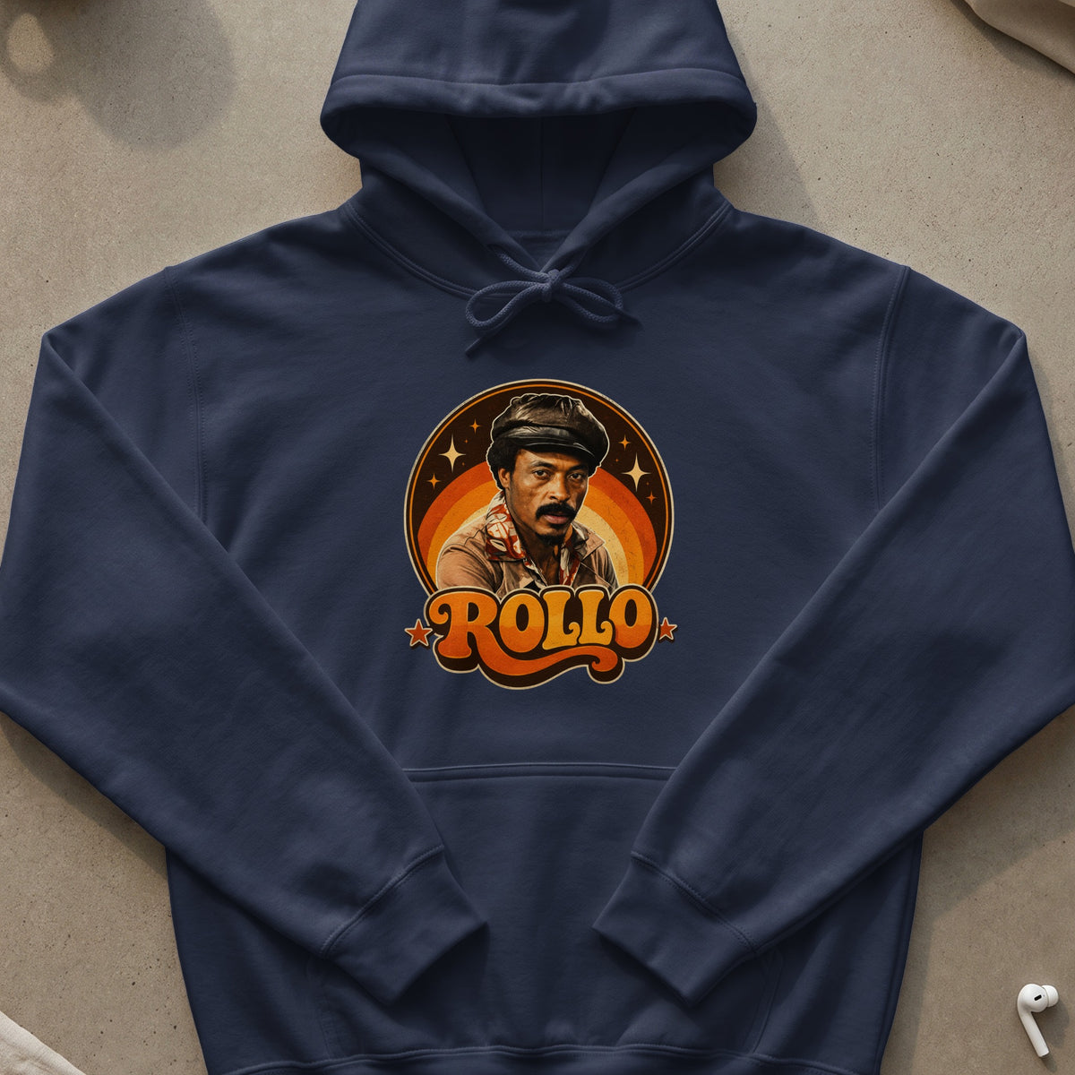 Navy blue hoodie with a vintage "Rollo" graphic featuring a man and retro sunset design.