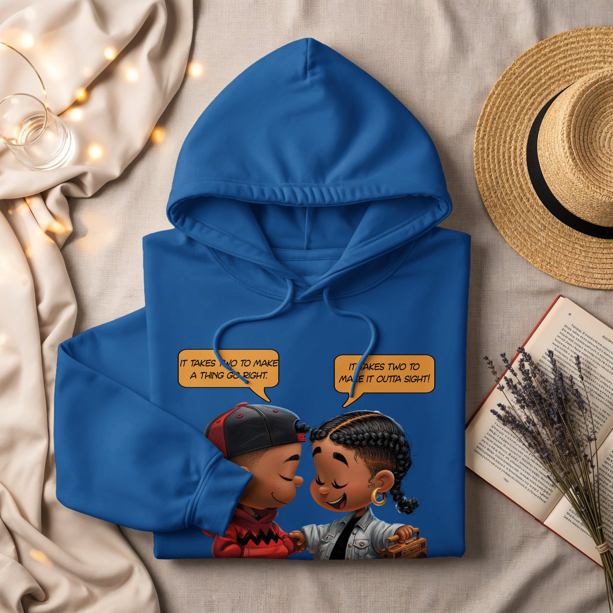 Blue hoodie with cartoon of two kids and text "It takes two to make a thing go right."