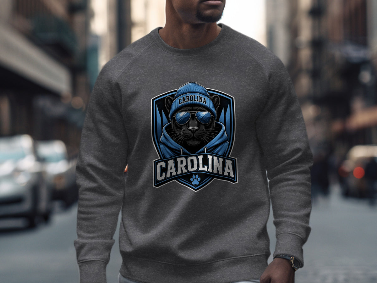 Black panther wearing sunglasses and beanie with "CAROLINA" text on sweatshirt.