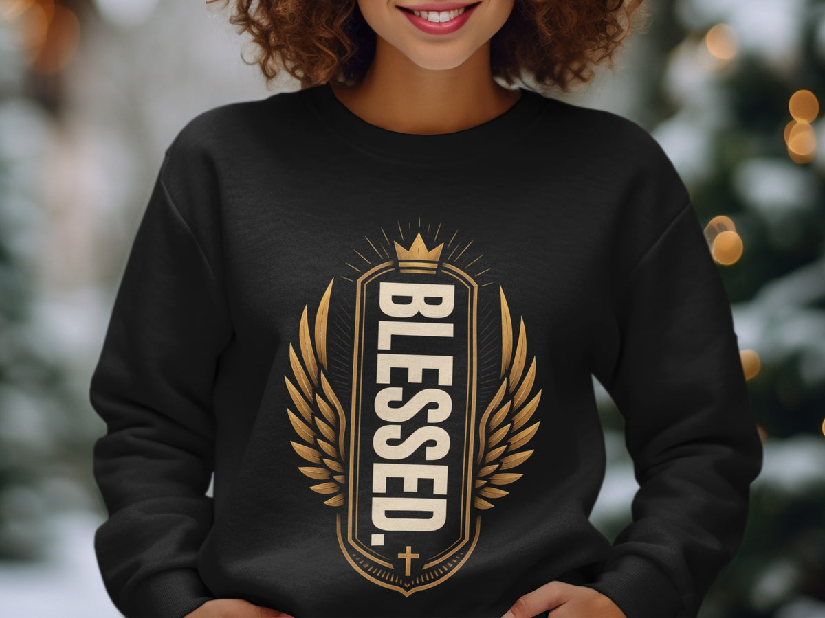 Black sweatshirt featuring "BLESSED" text with gold wings and crown graphic.