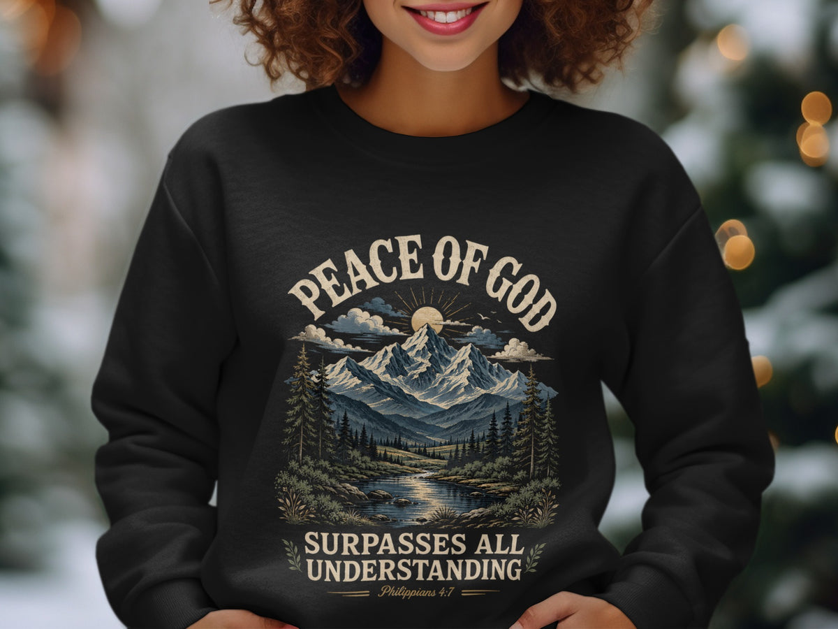 Black sweatshirt with "Peace of God Surpasses All Understanding" and mountain landscape.
