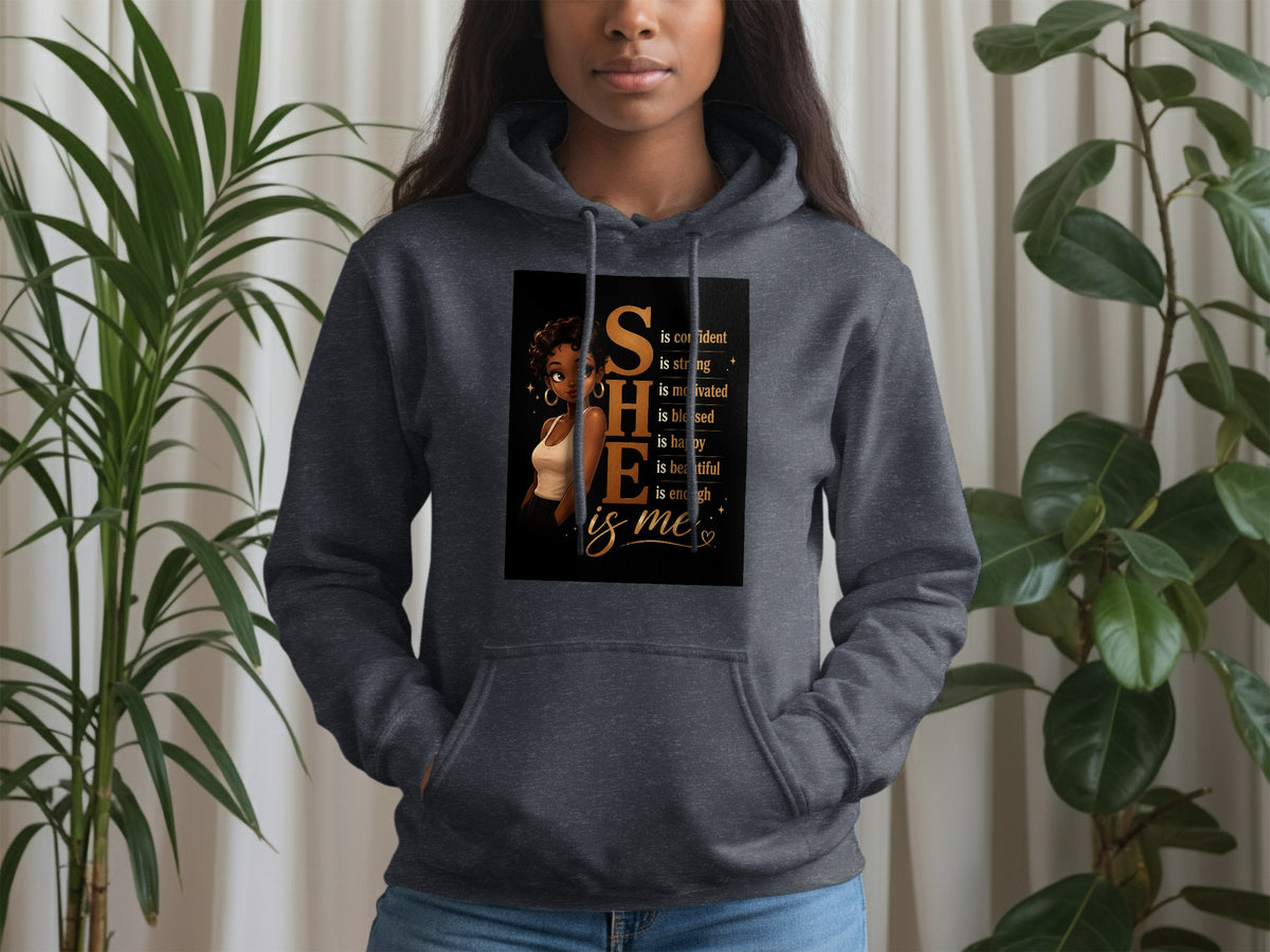 Dark grey hoodie featuring "SHE is confident, strong, motivated, blessed, happy, beautiful, enough" text.