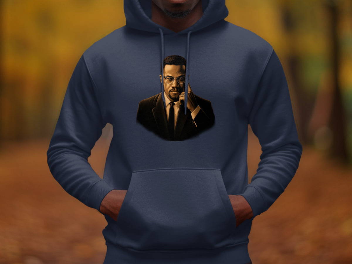 Dark navy hoodie with a portrait of Malcolm X in a suit and glasses on the chest.