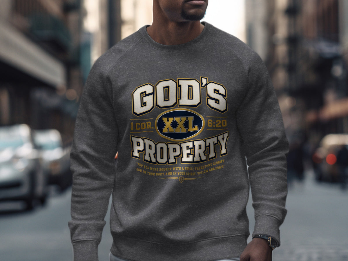 Dark grey sweatshirt with "GOD'S PROPERTY" and Bible verse 1 Corinthians 6:20.