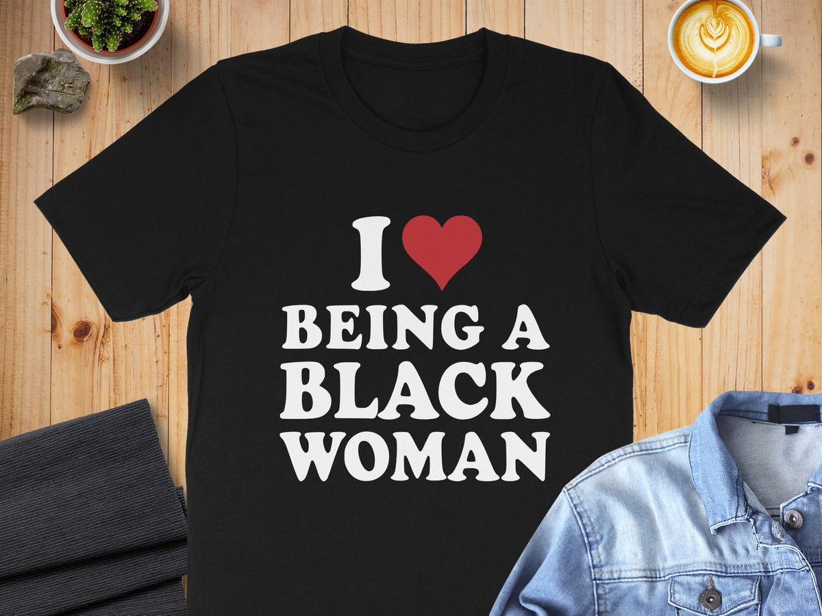Black t-shirt with text "I ❤️ BEING A BLACK WOMAN"