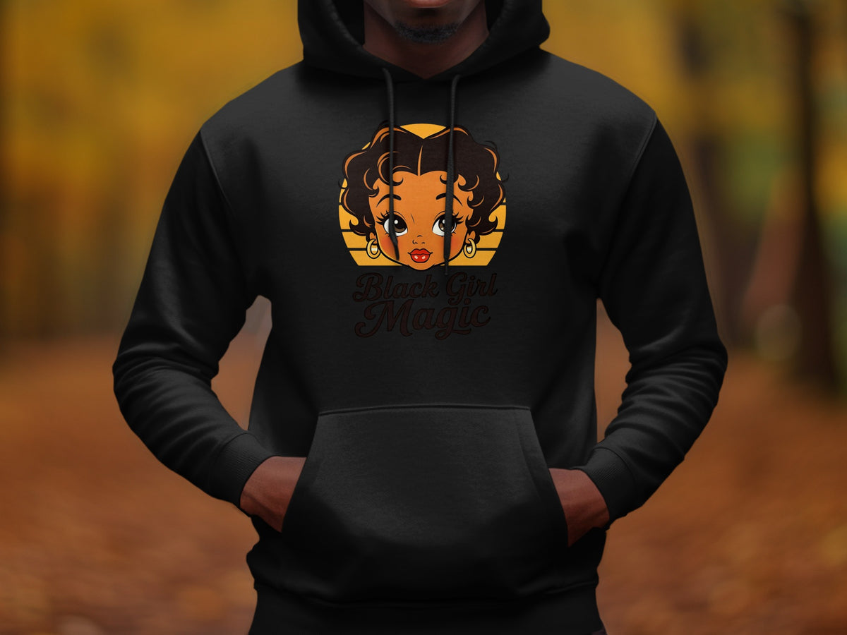 Black hoodie with a cartoon graphic of a Black girl and the text "Black Girl Magic."