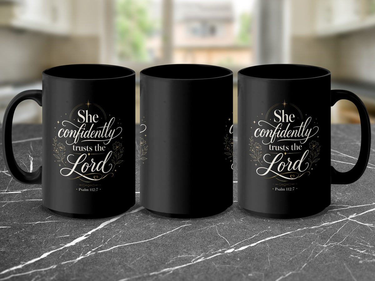 Black mug with "She confidently trusts the Lord" and "Psalm 112:7" in gold.