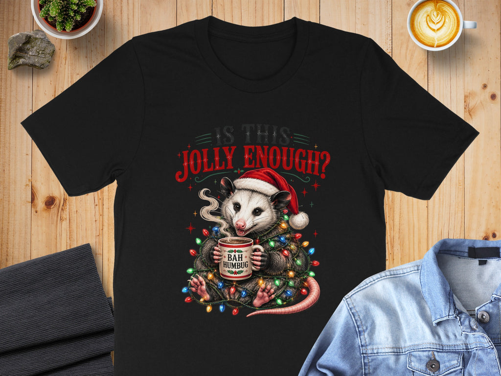 Black t-shirt with opossum in Christmas lights holding a "Bah Humbug" mug.