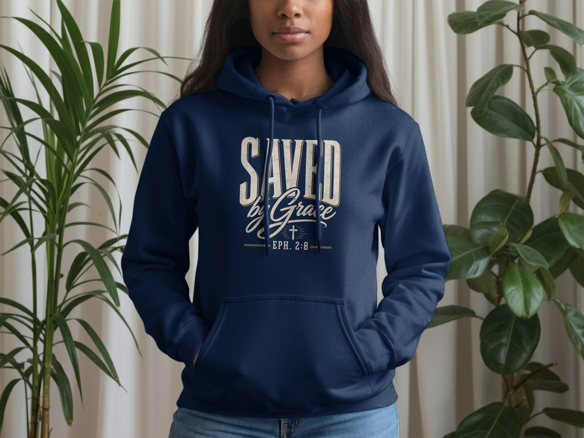 Navy hoodie with "Saved by Grace Eph. 2:8" text and cross graphic.