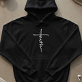 Black hoodie with white "faith" text on a cross.
