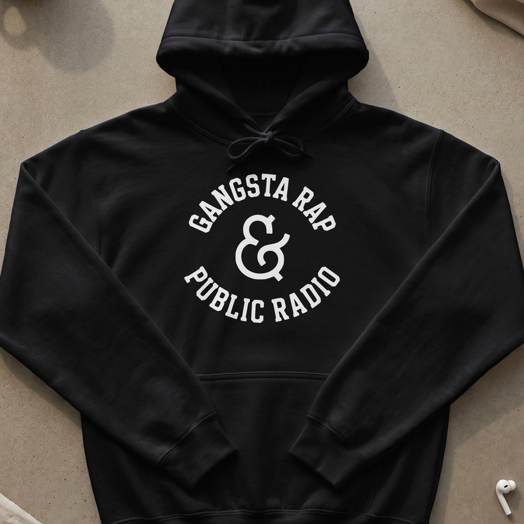 Black hoodie with white text "Gangsta Rap & Public Radio" in a circular design.