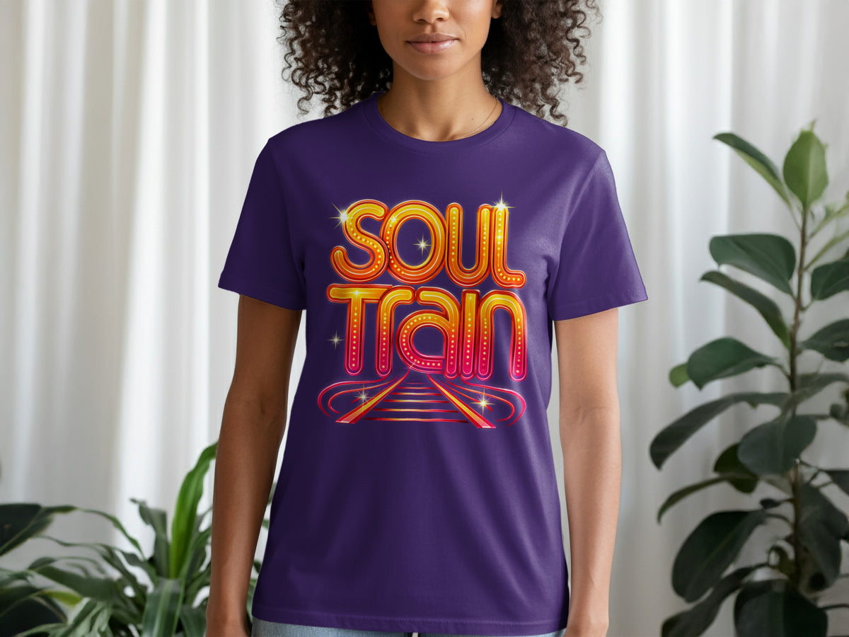 Purple t-shirt with "Soul Train" in glowing marquee font and railroad tracks.
