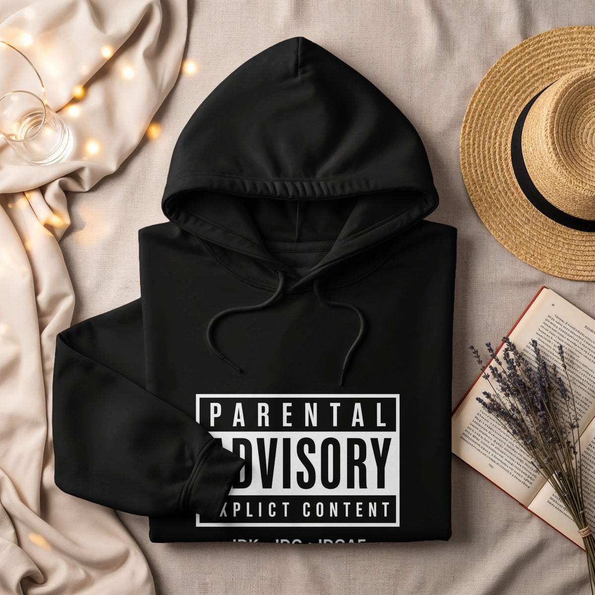 Black hoodie with white "Parental Advisory Explicit Content" graphic.