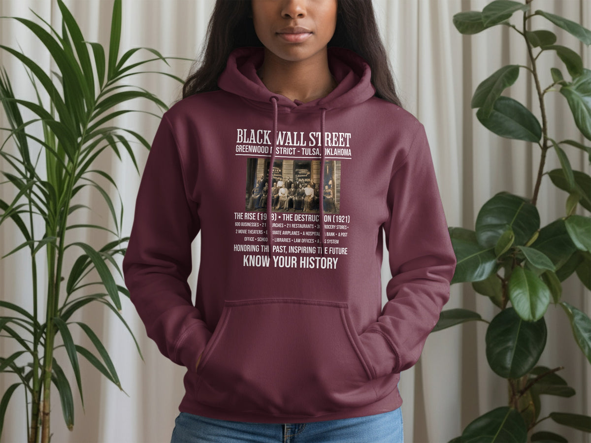 Maroon hoodie with "Black Wall Street Greenwood District Tulsa Oklahoma" text and historical details.