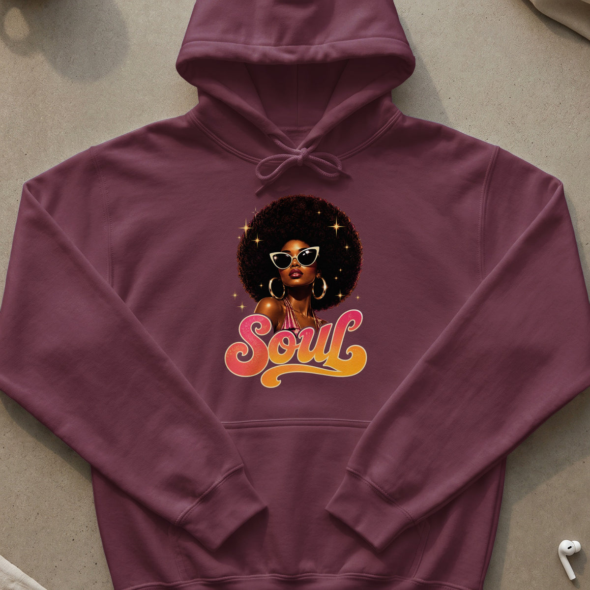 Maroon hoodie with a graphic of a woman with an afro and the word "Soul".