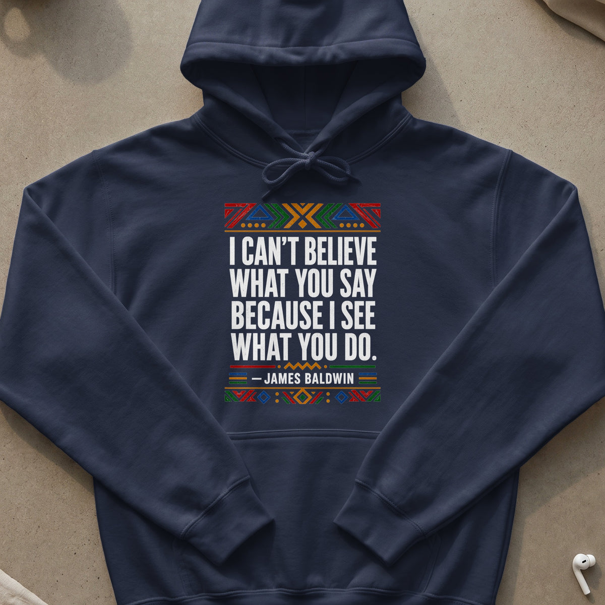 Navy hoodie with James Baldwin quote and colorful geometric design.