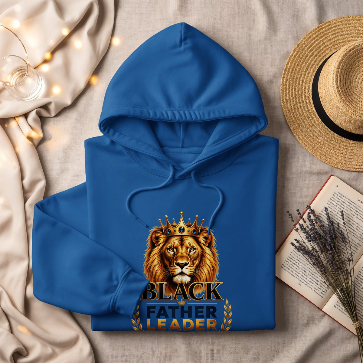 Blue hoodie with a crowned lion and "BLACK FATHER LEADER" text.