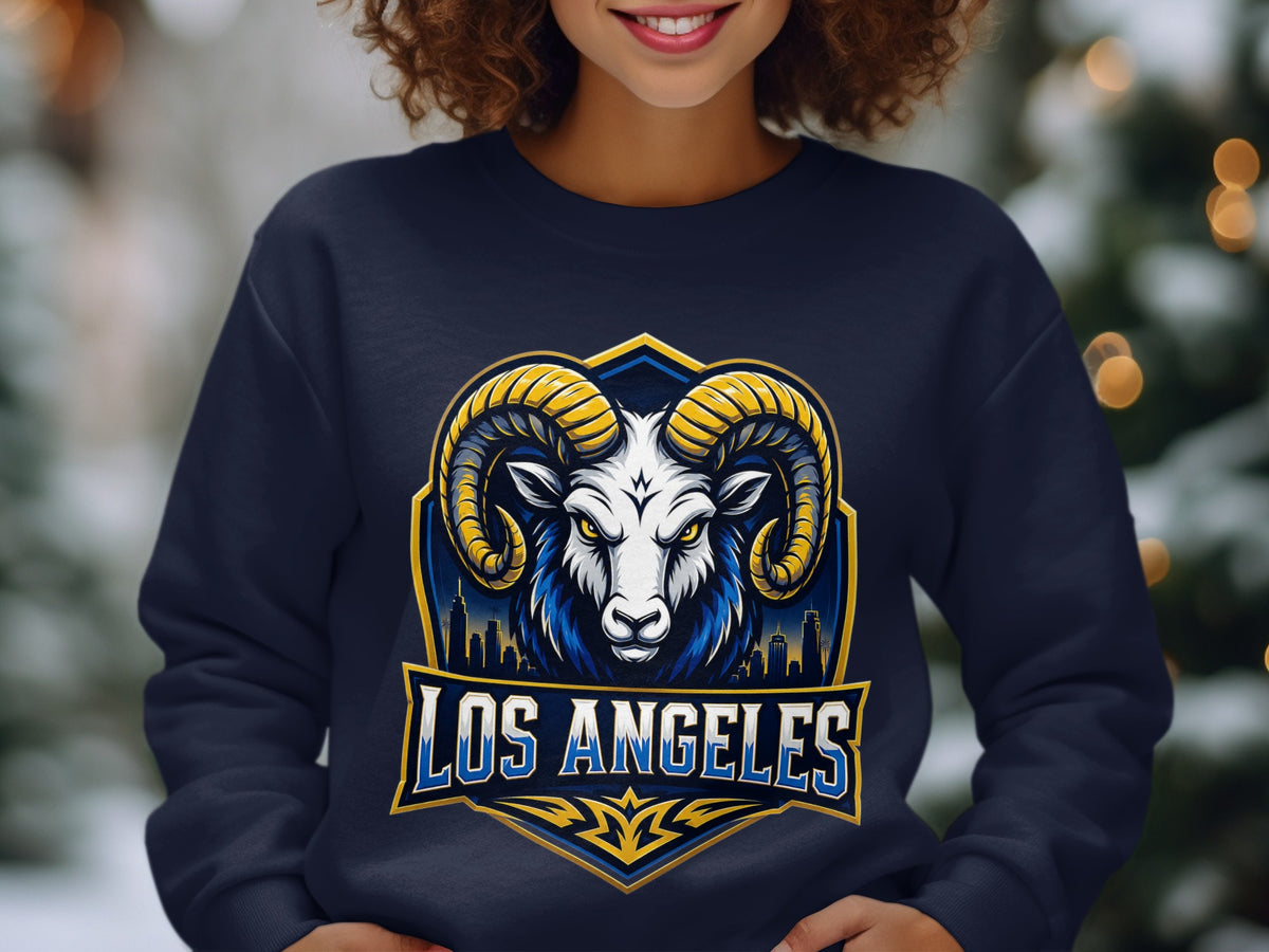 Navy sweatshirt with a Los Angeles Rams logo featuring a ram's head and city skyline.