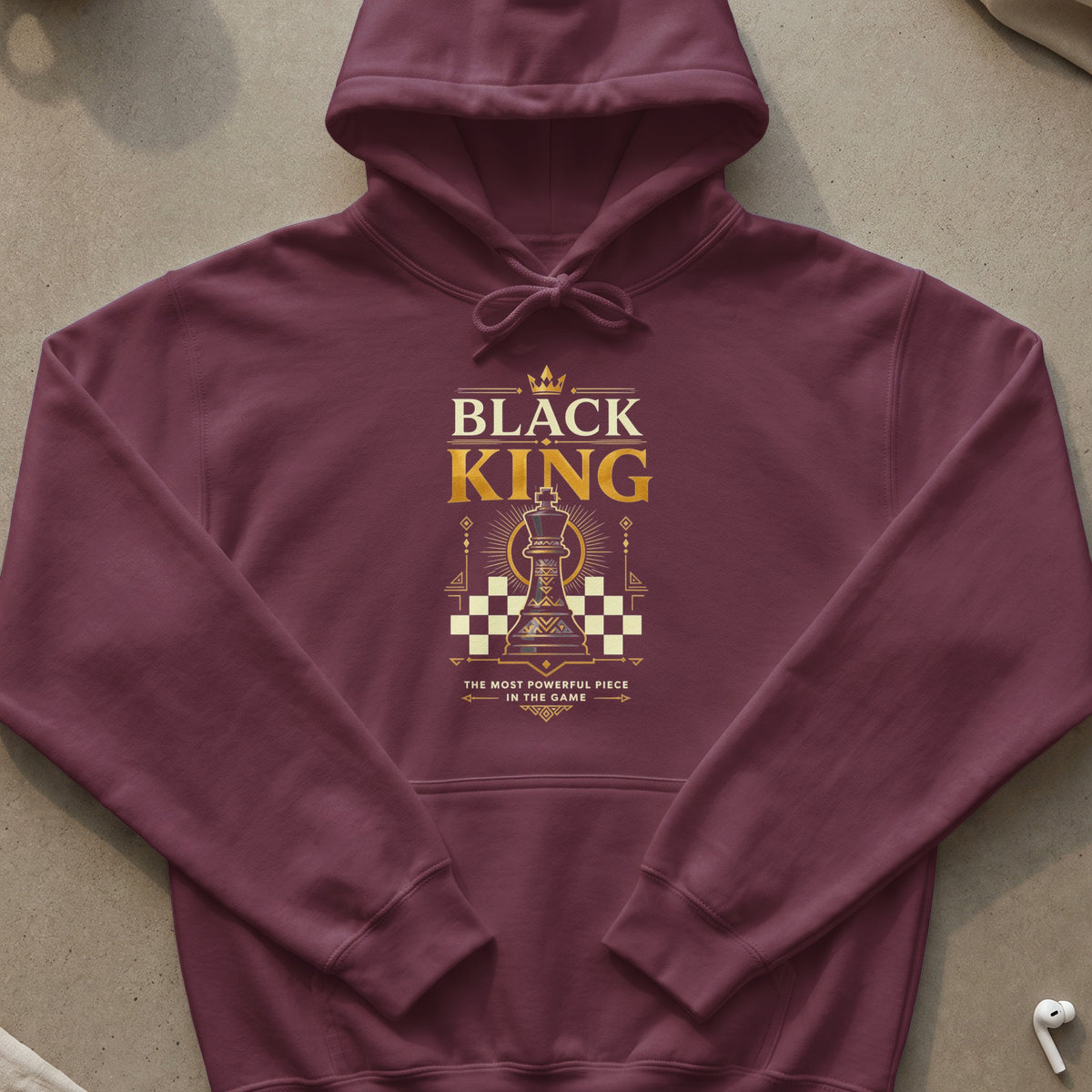 Maroon hoodie with "BLACK KING THE MOST POWERFUL PIECE IN THE GAME" text and chess king graphic.