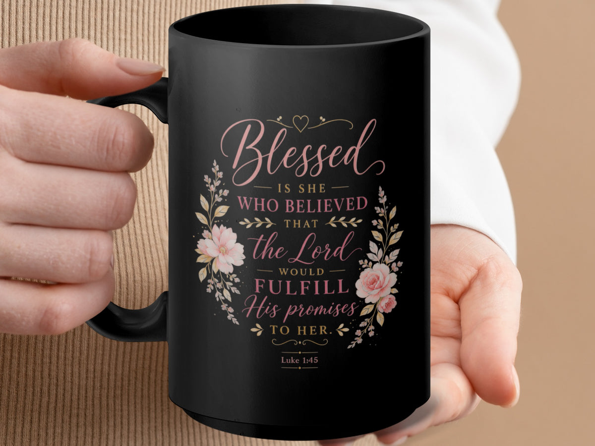 Black mug with "Blessed is she who believed that the Lord would fulfill His promises to her. Luke 1:45" text.