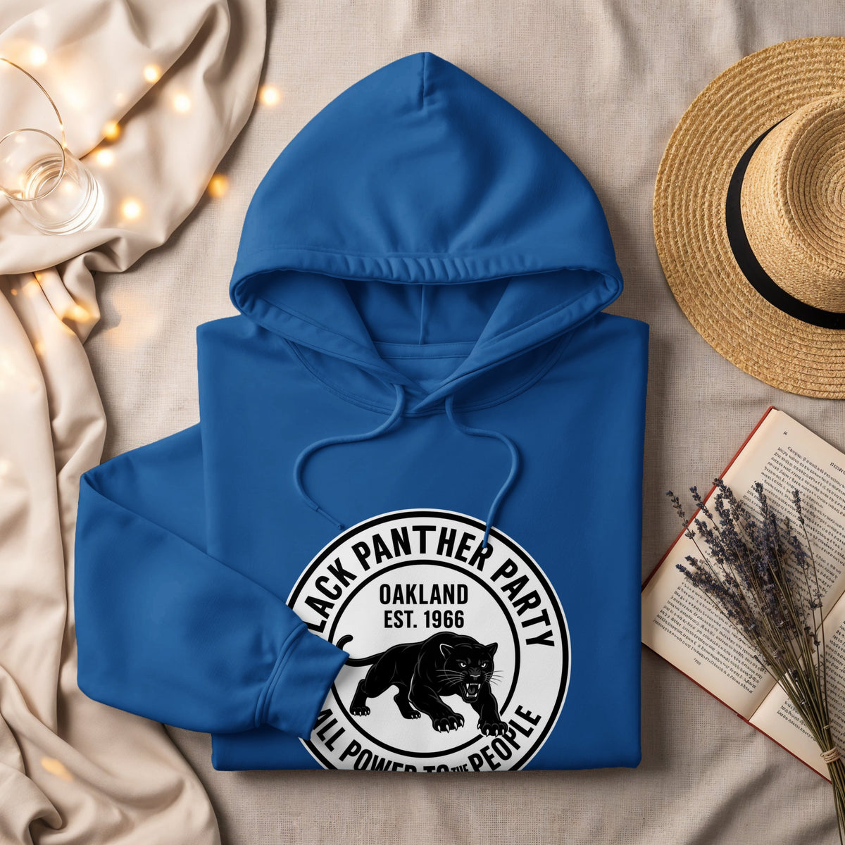 Blue hoodie with Black Panther Party logo: Oakland, Est. 1966, All Power to the People.