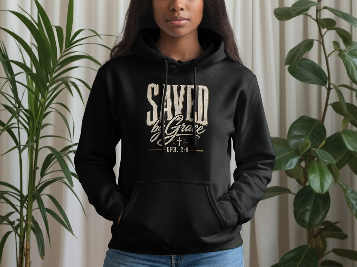 Black hoodie with "Saved by Grace" text and Ephesians 2:8 scripture.