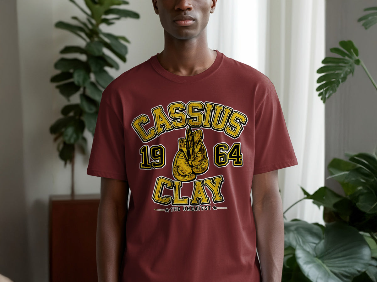 Cassius Clay 1964 "The Greatest" graphic on maroon t-shirt.