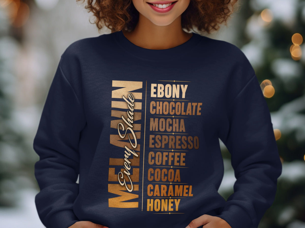 Navy sweatshirt with "MELANIN Every Shade" and list of brown shades.