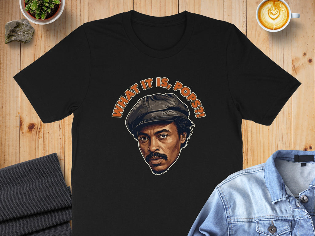 Black t-shirt with illustrated portrait and "What it is, Pops?!" text.