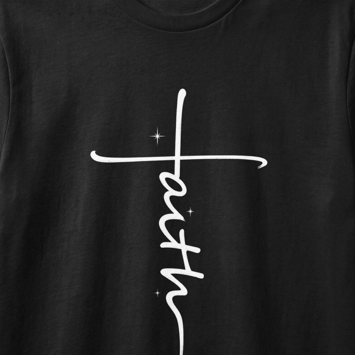 Black t-shirt with white cursive "faith" text forming a cross.