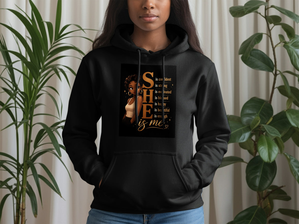 Black hoodie with "SHE is confident, strong, motivated, blessed, happy, beautiful, enough, is me" text.
