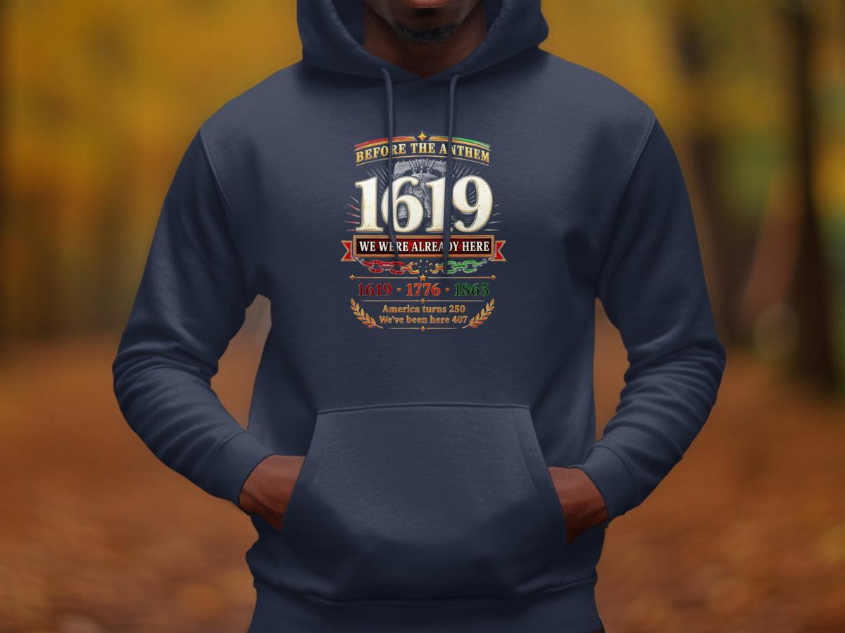 Navy hoodie with 1619 "Before the Anthem" graphic and dates 1619, 1776, 1865.