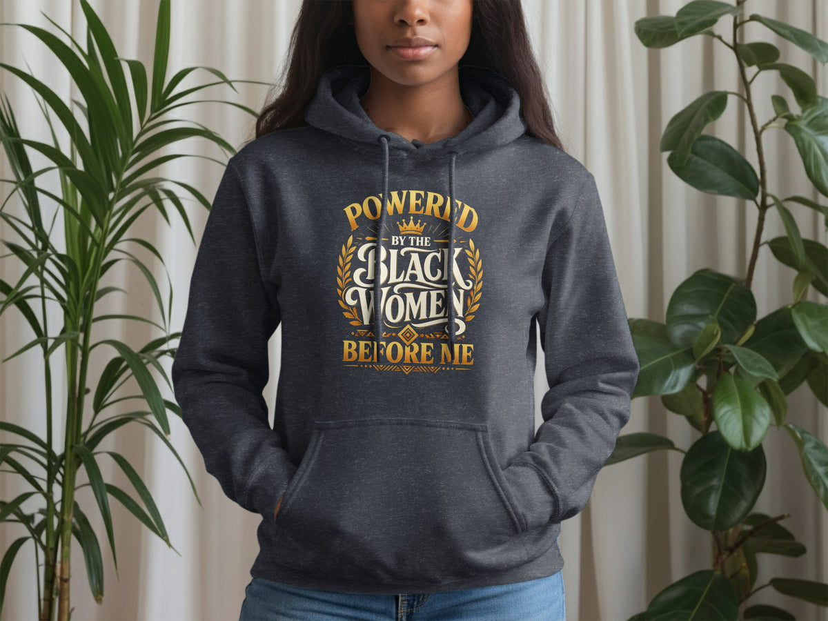 Dark gray hoodie with "Powered by the Black Women Before Me" text.