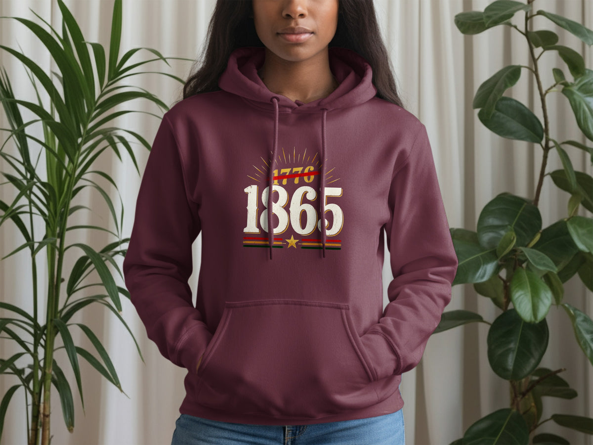 Maroon hoodie with 1776 strikethrough and 1865 text and star design.