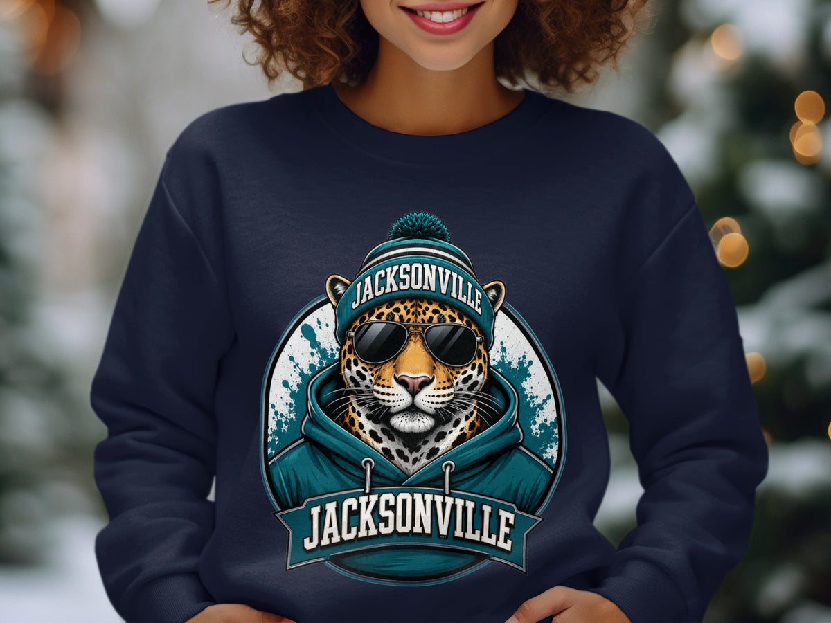 Jacksonville Jaguars inspired graphic on a navy sweatshirt featuring a leopard wearing sunglasses and a beanie.