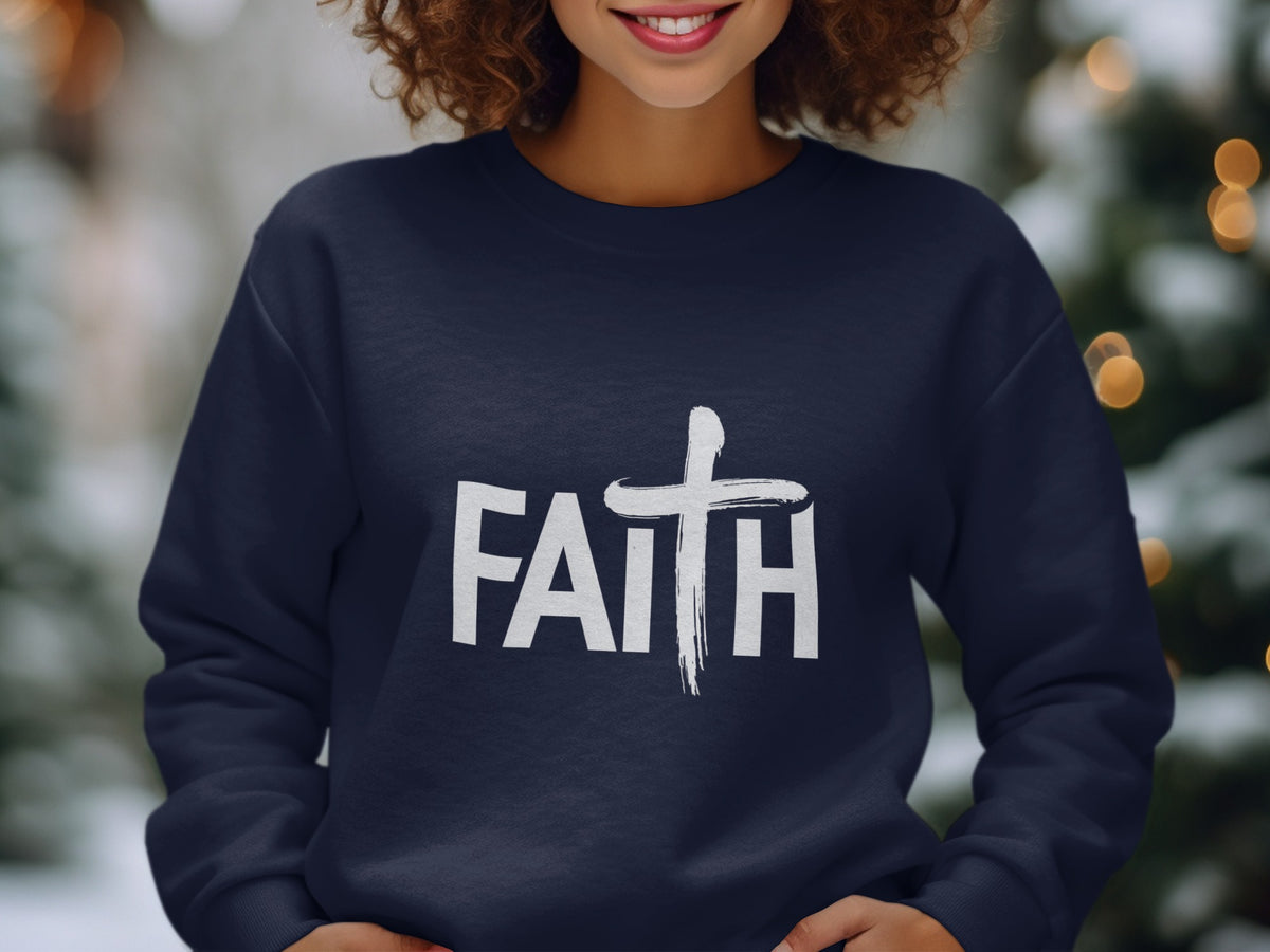 Navy sweatshirt with white "FAITH" text and a brushstroke cross design.