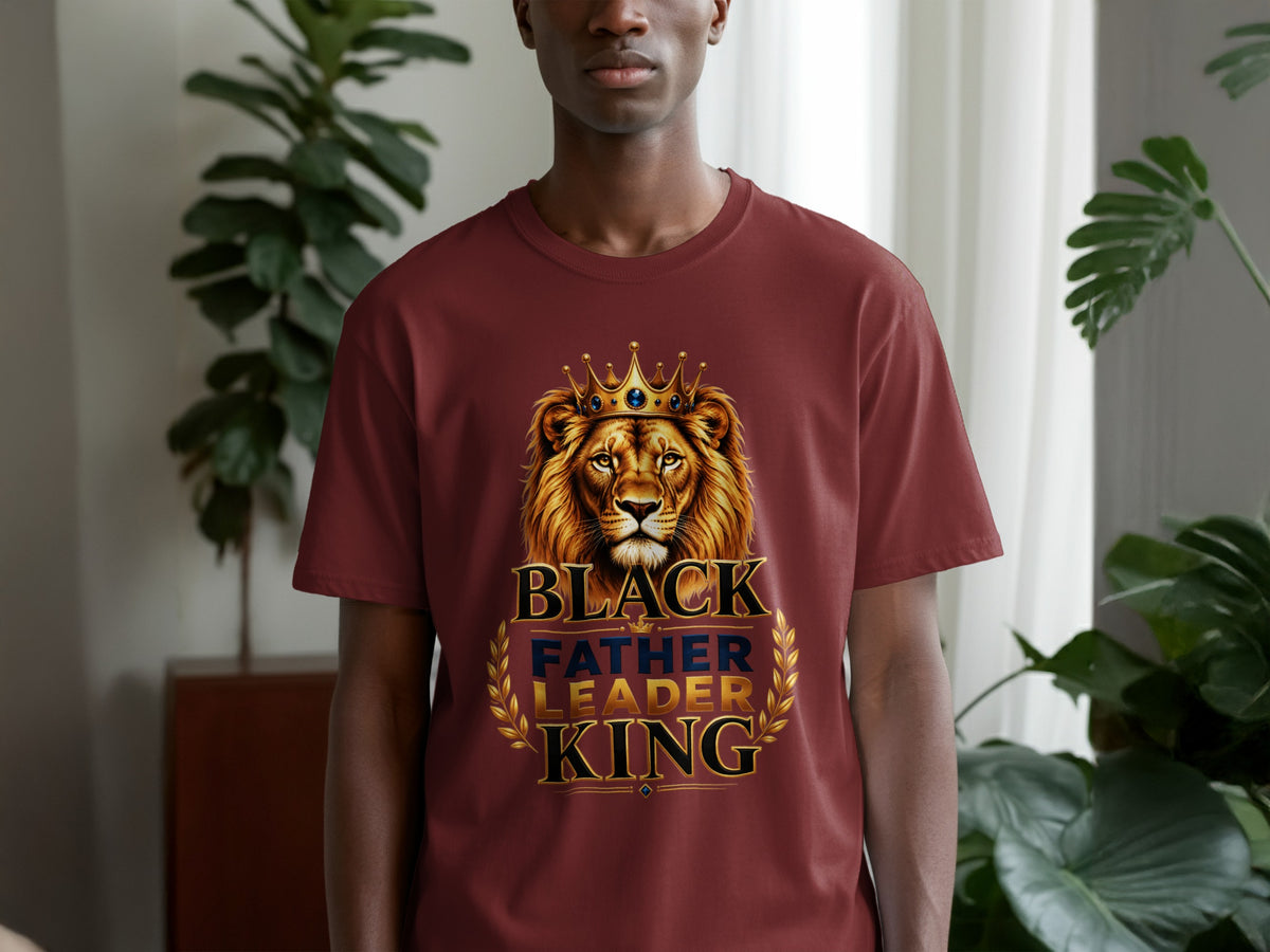 Maroon t-shirt with lion wearing crown and text "BLACK FATHER LEADER KING".